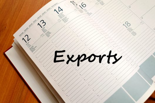 Exports text concept write on notebook with pen