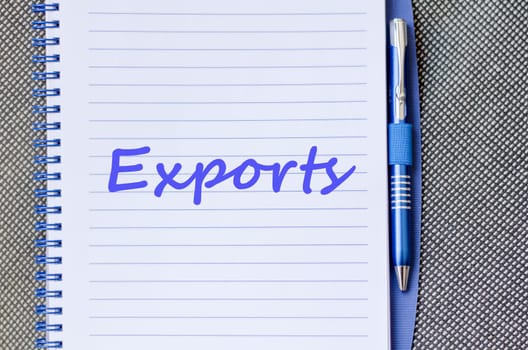 Exports text concept write on notebook with pen