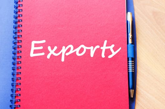 Exports text concept write on notebook with pen