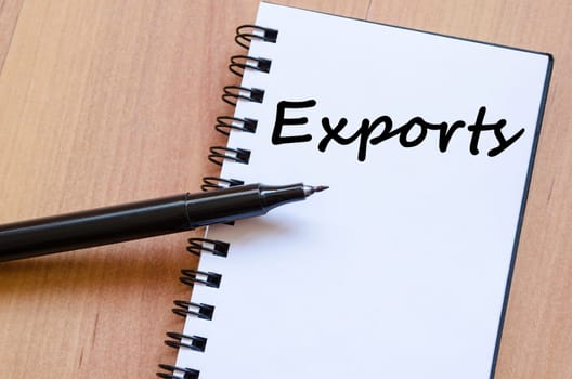 Exports text concept write on notebook with pen