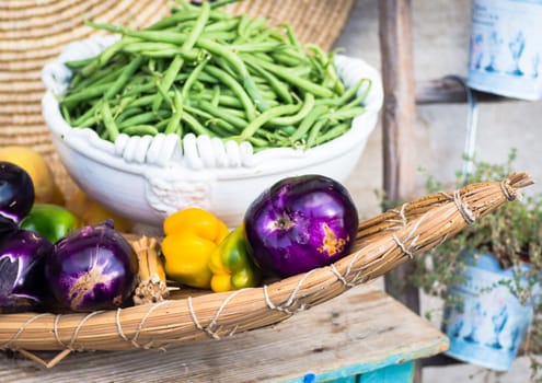 eggplant peppers grapes. Fruits and vegetables in season exposed in a street market
