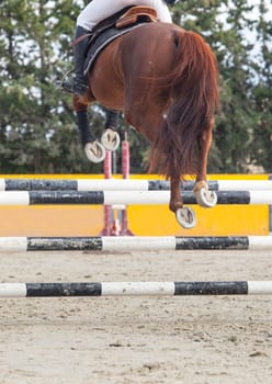 Detailed view of a boot rider with spurs at jumping competition