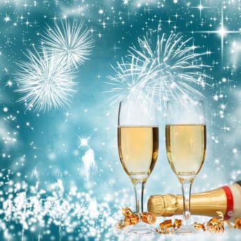 Champangne glasses on sparkling background