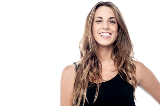 Fashion woman facing towards camera and smiling