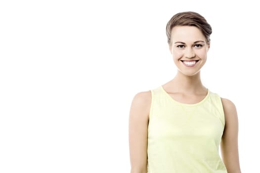 Smiling young woman posing to camera