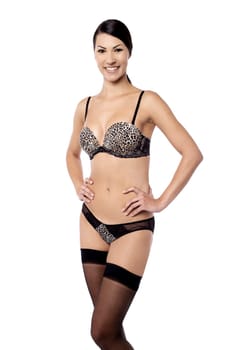 Pretty woman posing with hands on hip