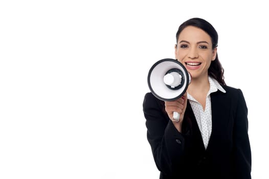 Portrait of a corporate woman with loudhailer
