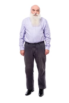 Full length image of a matured man posing to camera