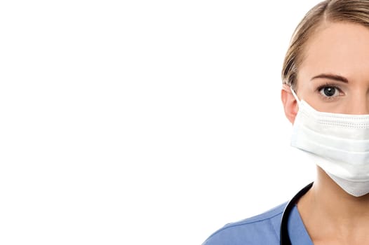 Cropped image of a female surgeon with surgical mask