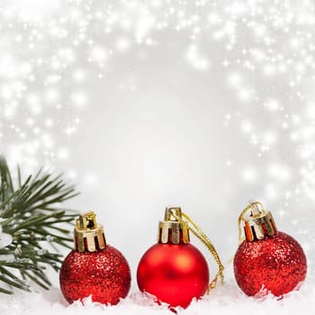 Sparkling Christmas background with red baubles