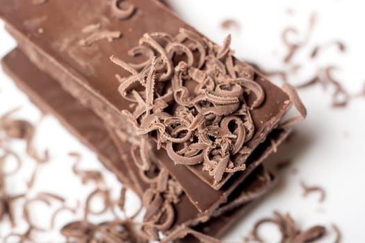 Parts of dark chocolate on the table