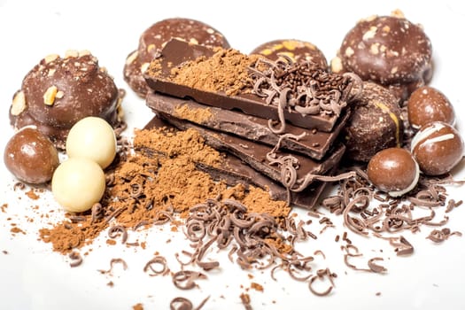 Parts of dark chocolate on the table