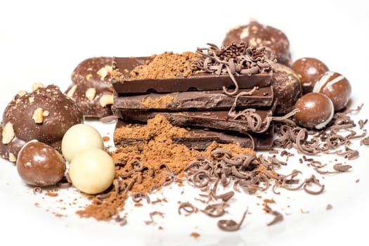 Parts of dark chocolate on the table