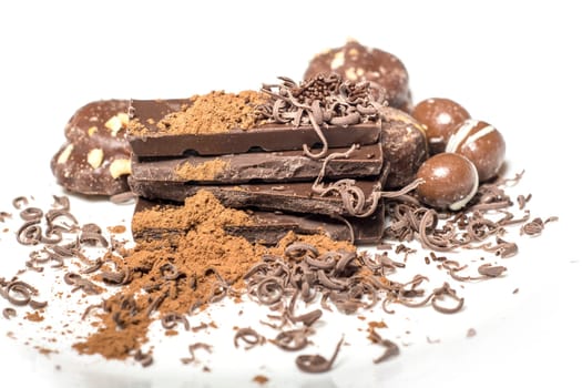 Parts of dark chocolate on the table