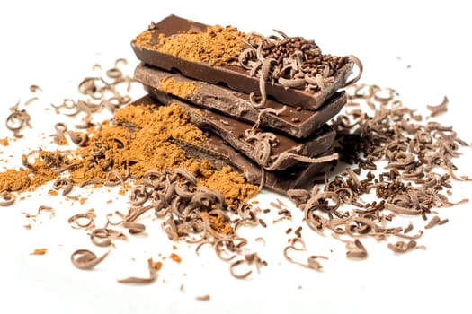 Parts of dark chocolate on the table