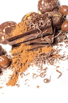 Parts of dark chocolate on the table