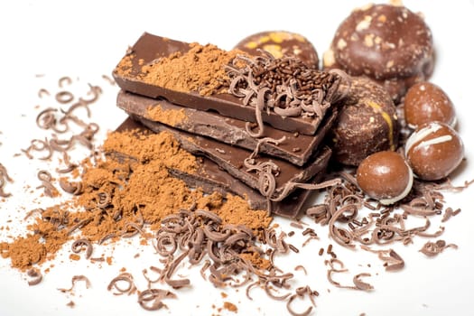 Parts of dark chocolate on the table