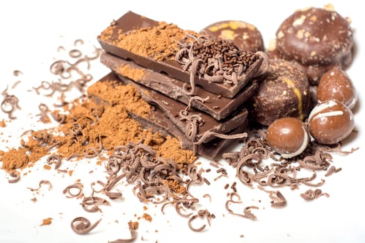 Parts of dark chocolate on the table