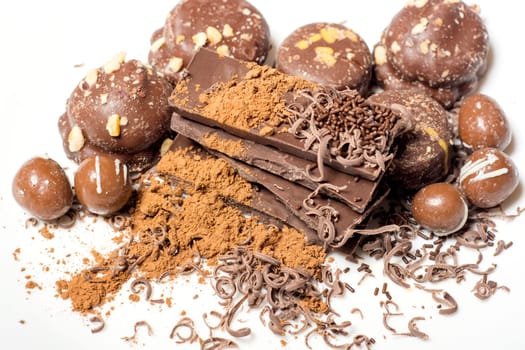 Parts of dark chocolate on the table