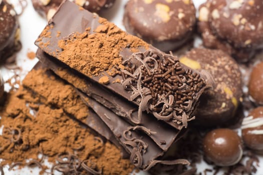 Parts of dark chocolate on the table