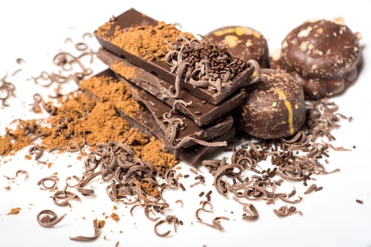 Parts of dark chocolate on the table