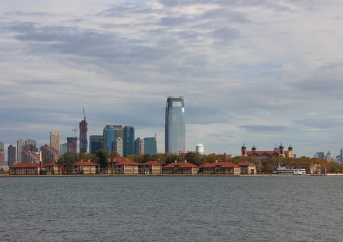 Ellis Island in New York with Hudson River and Skyline Horizon