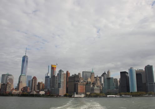 Leaving Manhattan Skyline with Ship White Water Foam Trail