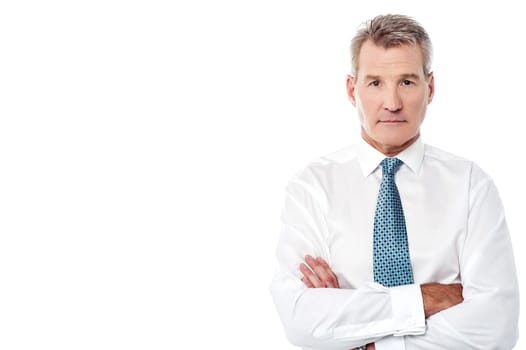 Image of a elder businessman with crossed arms
