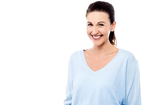 Pretty woman facing towards camera and smiling