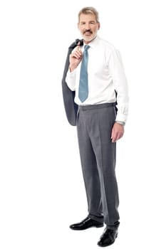 Image of a senior businessman holding coat over his shoulder