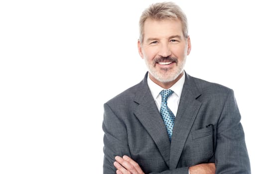 Senior businessman posing confidently