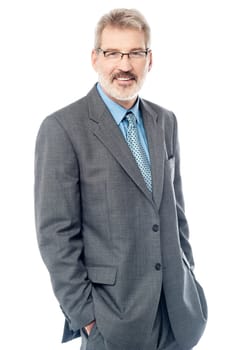 Portrait of a senior entrepreneur with hands in pockets