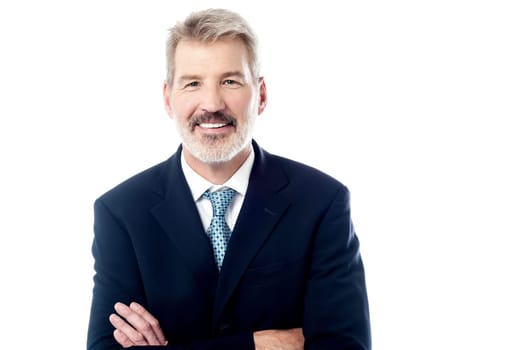 Elderly businessman posing to camera over white