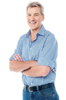 Portrait of a senior male with crossed arms