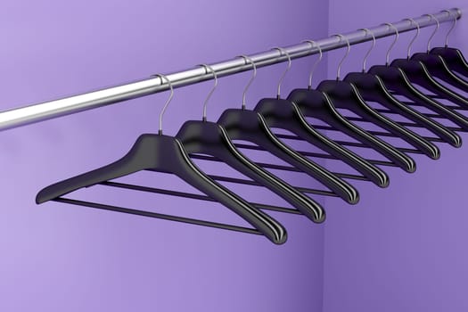 Plastic hangers hanging on rod in the closet