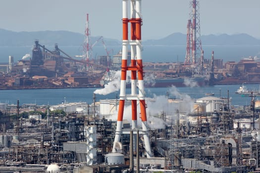 industrial plant with smoke stacks, industrial area