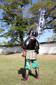 KAGAWA, JAPAN - OCTOBER 25: Ancient firelock rifle fighters at Marugame Historical battle Festival, event dedicated to Japanese culture and tradition at Marugame-castle on October 25, 2015 in Japan.
