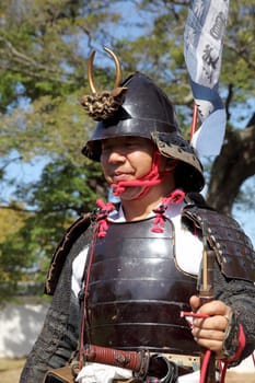 KAGAWA, JAPAN - OCTOBER 25: Ancient firelock rifle fighters at Marugame Historical battle Festival, event dedicated to Japanese culture and tradition at Marugame-castle on October 25, 2015 in Japan.