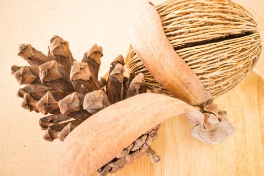 Mix of dried plant ornament on wooden background, stock photo