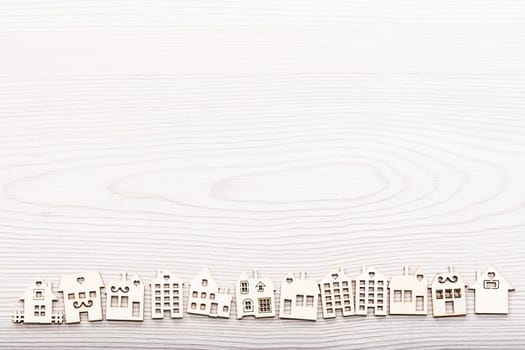 little village of house wooden figures on a surface in wood