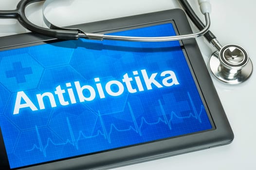 Tablet with the text antibiotics on display