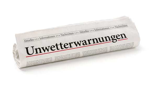 Newspaper roll headlined Severe Weather Warnings