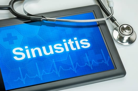 Tablet with the text sinusitis on the display