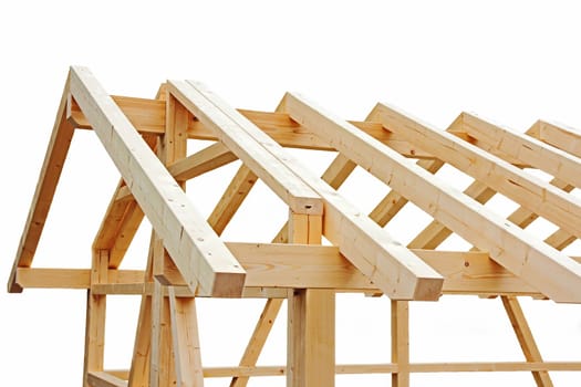 The shell with roof truss of a small wooden house or a wooden garage