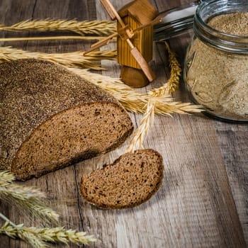 Black homemade bread and rye cones, close-up