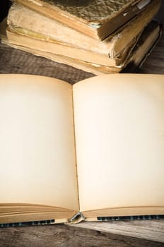old grunge open notebook on a wooden surface