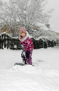 Child with snow slider