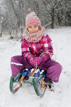 Girl with sledge