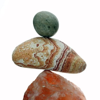 Details of a stone balance isolated on white background.