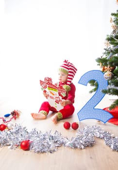 2 year old baby boy Christmas shooting in studio.
